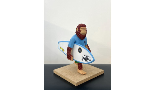 Ape on surfboard